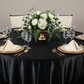 corporate dinner using Premium Satin (Wrinkle-Resistant) 120" Round Tablecloth - Black with ivory napkin and chair sash tie