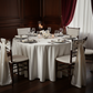 private dinner with Premium Satin (Wrinkle-Resistant) 132" Round Tablecloth - Ivory 
