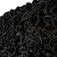 Roll up flower wall backdrop black flower close up angle