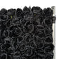 Roll up flower wall backdrop black right corner close up