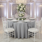 Round Premium Polyester 132" Tablecloth - Gray/Silver with silver charger plate | white dinner plate | silver/gray napkin | white chiavari chair | wine goblets