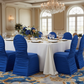 Ruched Fashion Spandex Banquet Chair Cover - Royal Blue for charity auction with gold charger plate | white napkin | white tablecloth | wine goblets