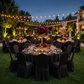 Outdoor gathering with the Ruffled Pleated Bottom Spandex Banquet Chair Cover Black with black tablecloths, rose centerpieces, tapered candles and gold charger plates
