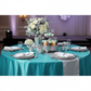 Satin 120" Round Tablecloth - Dark Turquoise with white dinner plate | silver charger plate | wine goblets  white napkin | silver napkin ring | flower centerpiece