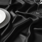 close up image Satin 132" Round Tablecloth - Black