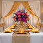 indoor birthday setup using Satin Napkin 20"x20" - Bright Gold with gold charger plate and white tablecloth
