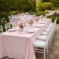 Satin Rectangular 90"x132" Tablecloth - Pastel Pink for outdoor baby shower reception with white dinner and charger plate on top | floral centerpieces
