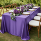 Satin-Rectangular-90x132-Tablecloth-Purple for outdoor garden party table with gold charger plate | white napkin 