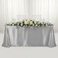 Satin Rectangular 90"x132" Tablecloth - Silver for a wedding sweetheart table with flower premade runner | wine goblets | silver chiavari chair 