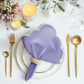 4 pc/pk Scalloped Edge Linen Napkin Lavender/White Trim with napkin ring, charger plate, and candles