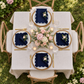 Bridal shower with pocket-folded navy scalloped napkin
