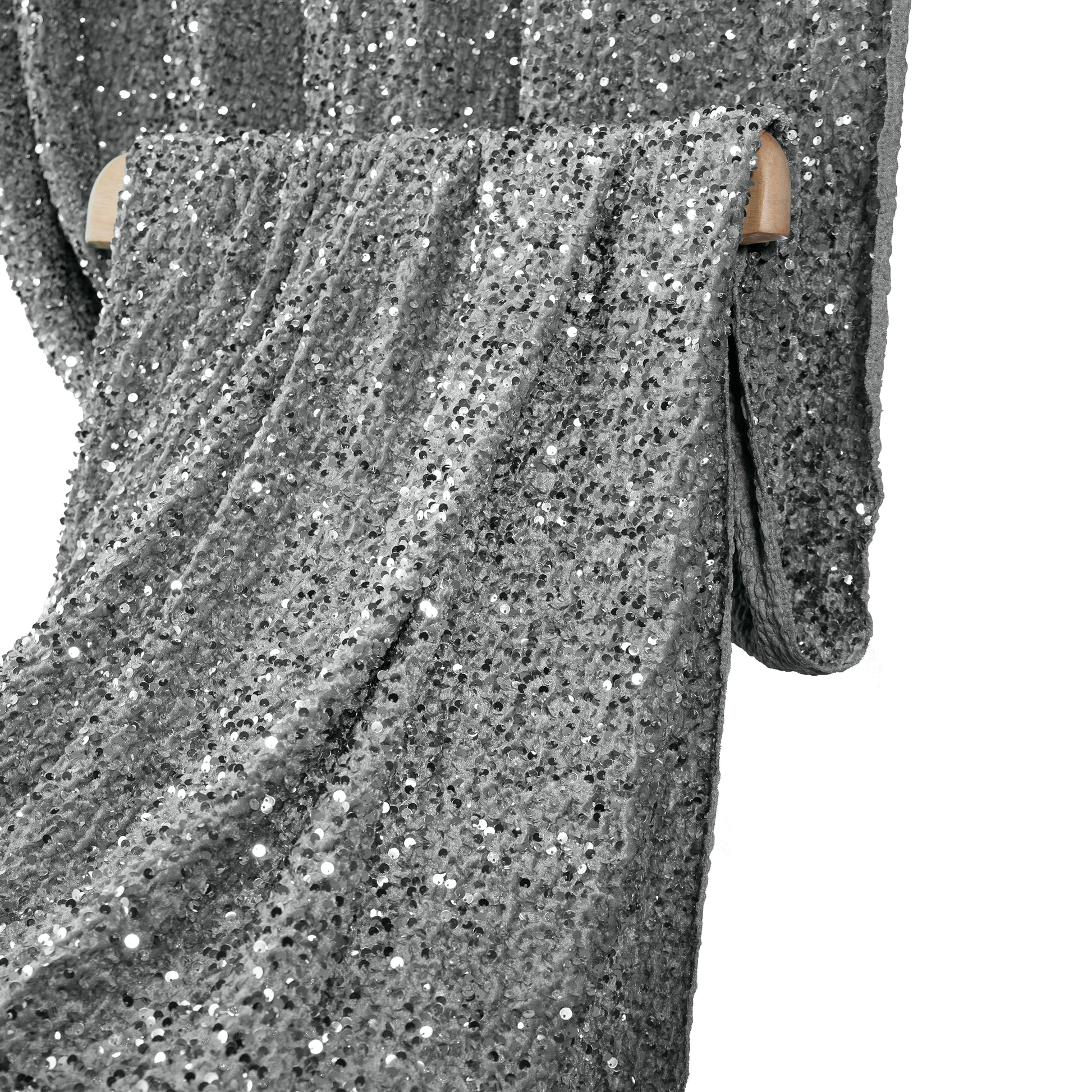 Sequin Velvet Drape Silver draped over a chair
