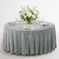 sequin velvet round silver with charger plates, wine goblets and florals