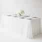 Sequin velvet rectangular tablecloth white with charger plates and wine goblets