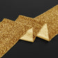 Sequin Velvet Table Runner Gold scrunched on top a black tablecloth