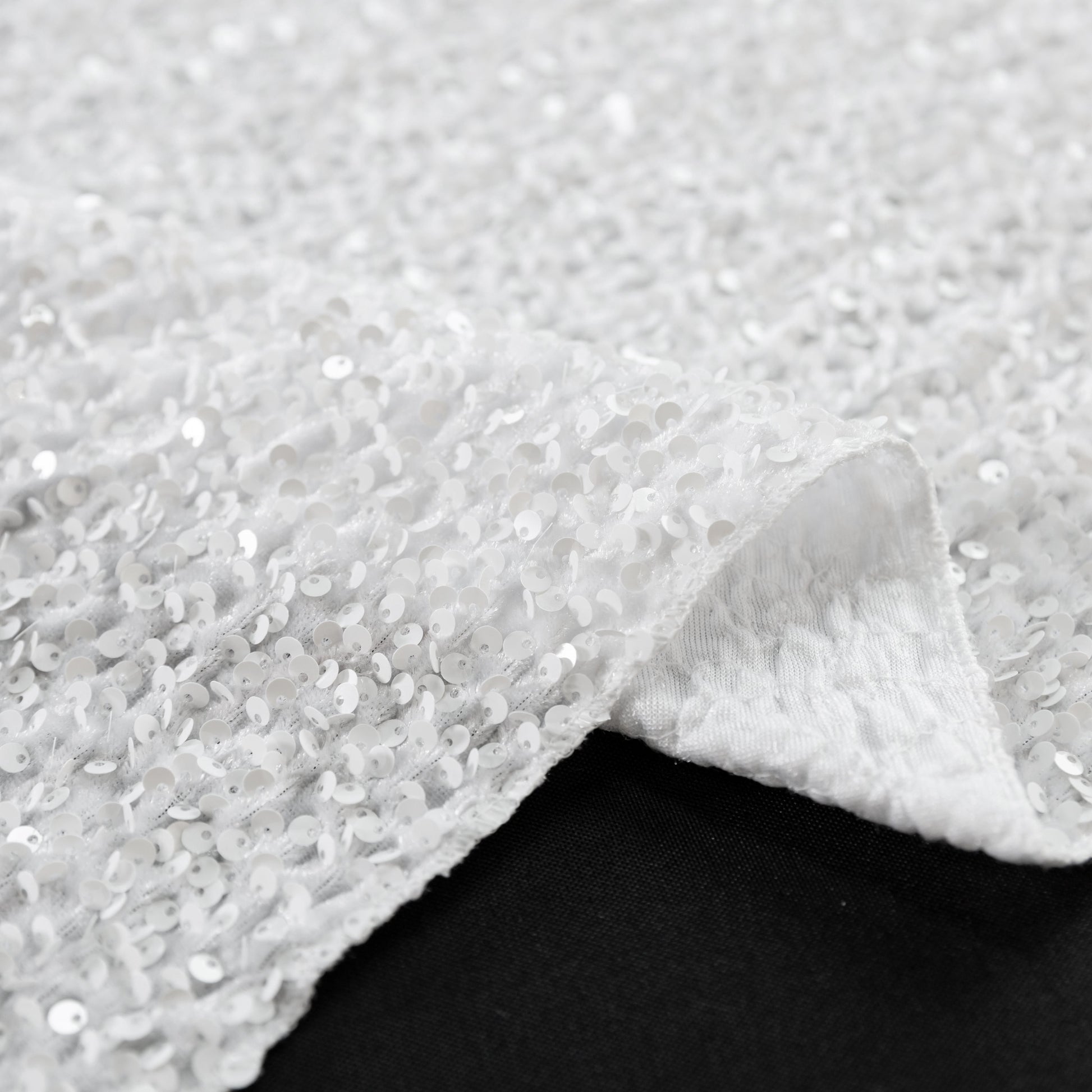Sequin Velvet Table Runner White serged dege finish close up