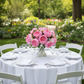 Silk Artificial Peony Flower Bush Bundle - Light Pink on white table setting | white dinner plate | white napkin | wine goblets | white folding chairs