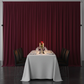 minimalist indoor dinner setup with Spandex 4-way Stretch Backdrop Drape Curtain 18ft H x 60" W - Burgundy