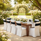 outdoor table setting with Black Spandex Chair Bands over a spandex white banquet chair cover