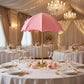 Spandex Cover for Adjustable Umbrella Centerpiece Stand Pink on a round table with water glasses and pink roses