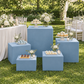 Baby-blue square pedestal covers at a garden wedding