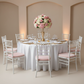 Taffeta Tablecloth 132" Round - White | charger plate | dinner plate | wine goblet | napkin | flower centerpiece |