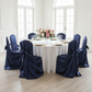Universal Satin Self Tie Chair Cover - Navy Blue with ivory tablecloth | gold charger plate | white dinner plate | wine goblets