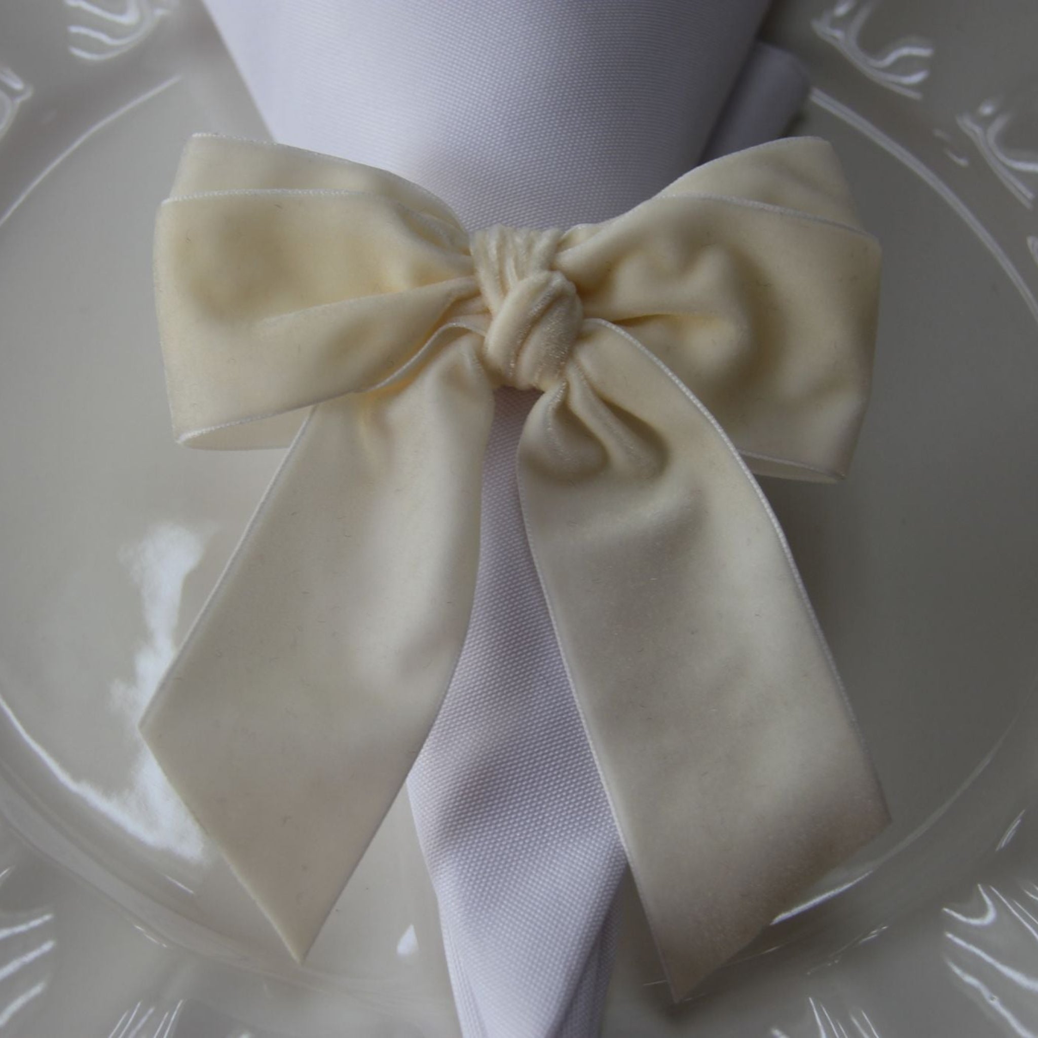 Velvet Bow Tie Napkin Ring Ivory close up