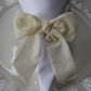 Velvet Bow Tie Napkin Ring Ivory close up