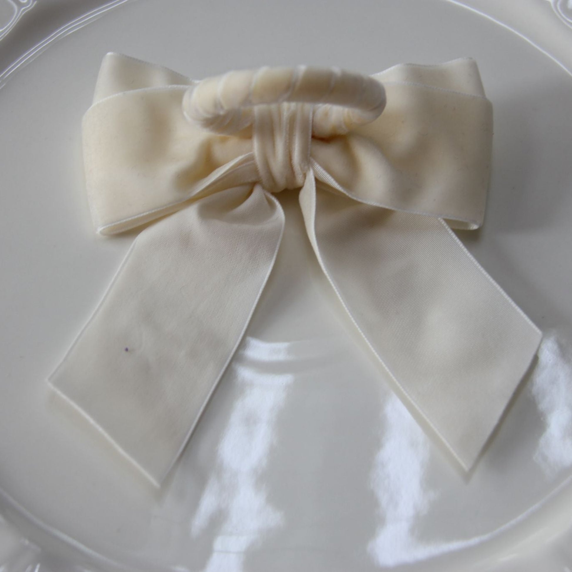 Velvet Bow Tie Napkin Ring Ivory backside  view