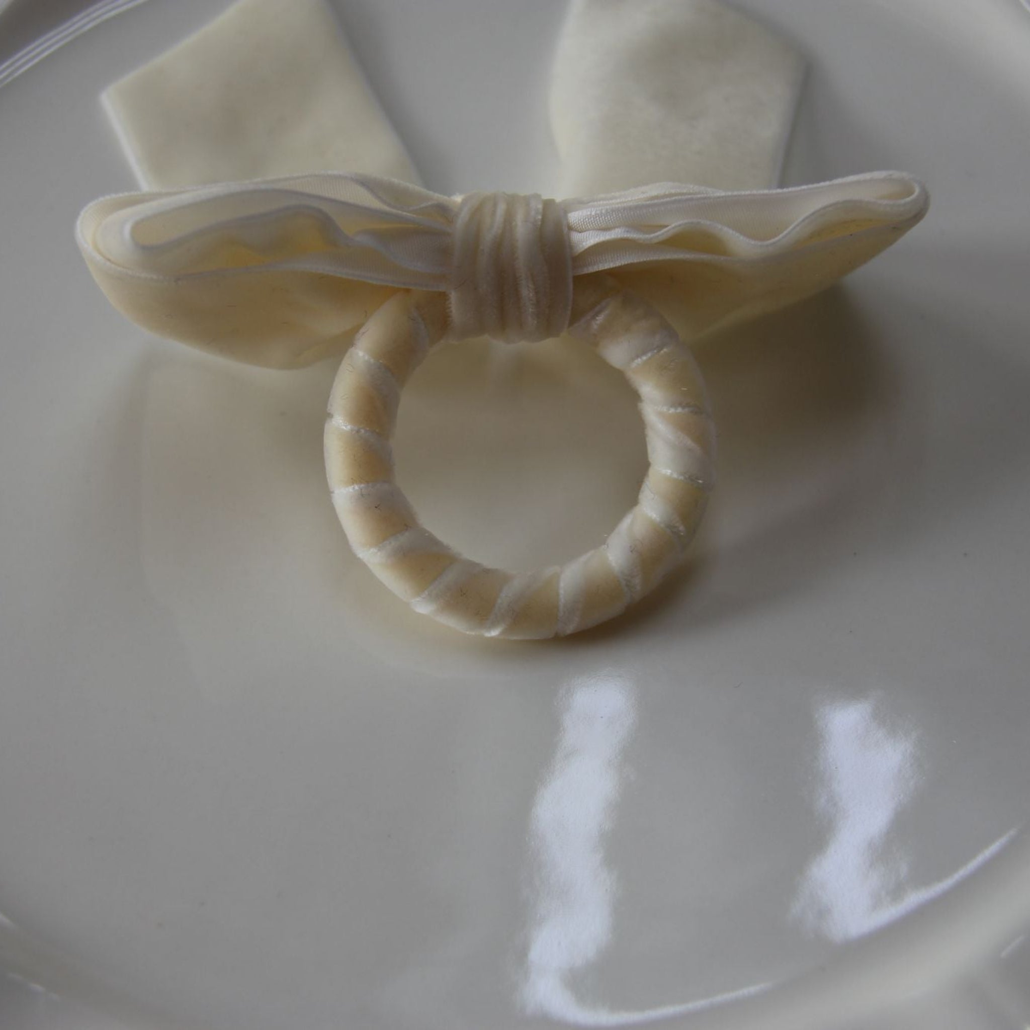 Velvet Bow Tie Napkin Ring Ivory close up of the ring backside