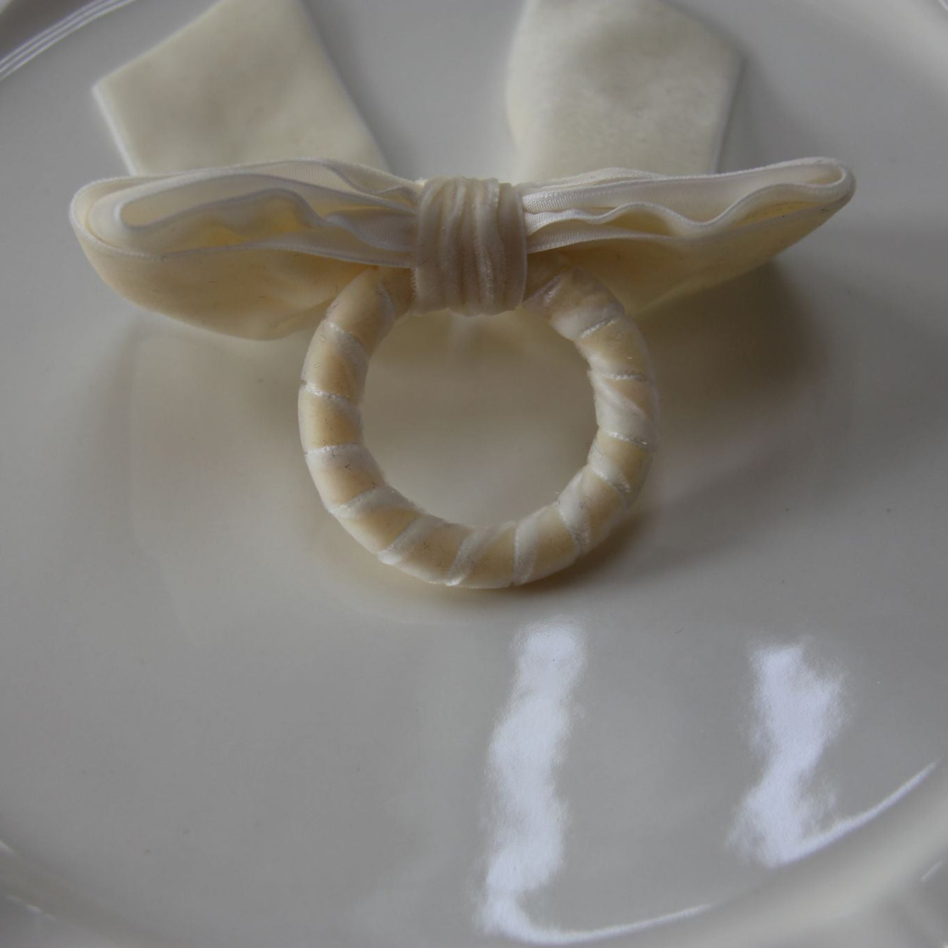 Velvet Bow Tie Napkin Ring Ivory close up of the ring backside