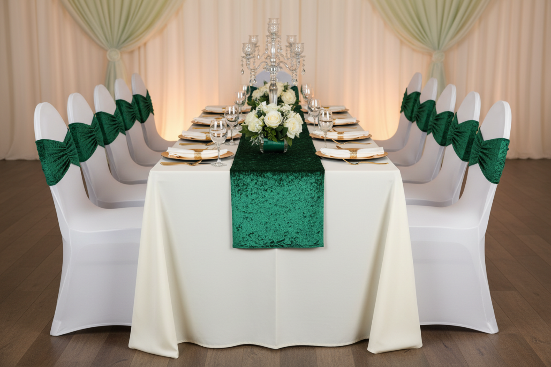 wedding reception with Velvet Ruffle Stretch Chair Band - Emerald Green and ivory tablecloth