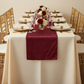 Velvet Table Runner - Burgundy on top of ivory tablecloth | gold charger plate | white napkin | flower centerpiece | gold chiavari chair