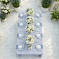 Vintage Lace Print Scuba Rectangular Tablecloth Dusty Blue/White with dusty blue napkins and white and blue floral centerpieces birdseye view