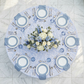 Vintage Lace Print Scuba Round Tablecloth Dusty Blue/White with dusty blue napkins and white and blue floral centerpieces birdseye view