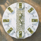 birdseye view Vintage Lace Print Scuba Table Runner Olive Green/White with greenery and votive candles