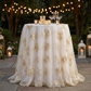 Vintage Veil Embroidery 108" Round Tablecloth/Overlay Topper Champagne on a cocktail table with wine glasses and votive candle holders