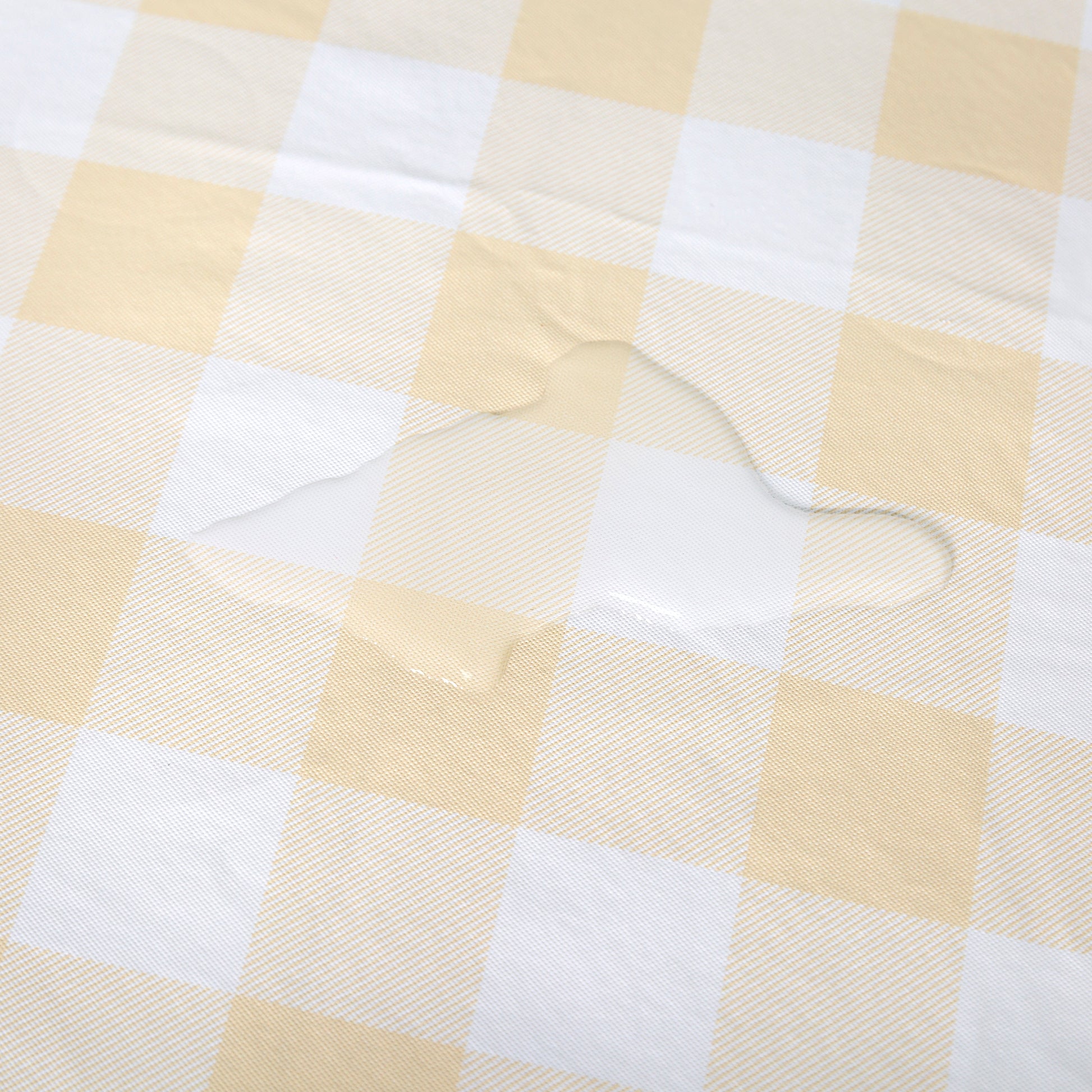 Waterproof Vinyl Flannel Backing Checkered Design Champagne fabric close up