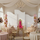 quinceañera with Wave Top Chiara Arch Backdrop Frame Stands 3pc/set
and Spandex Arch Covers for Heavy Duty Wave Frame Backdrop 3pc/set - White