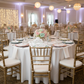 Baby shower with the Premium Satin (Wrinkle-Resistant) Round Tablecloth and pastel colored charger plates and centerpieces