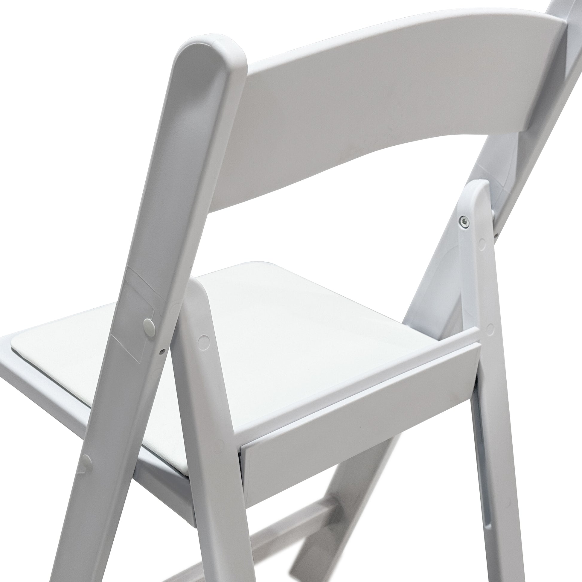 White Resin Folding Chair 4pc/pk angled view close up