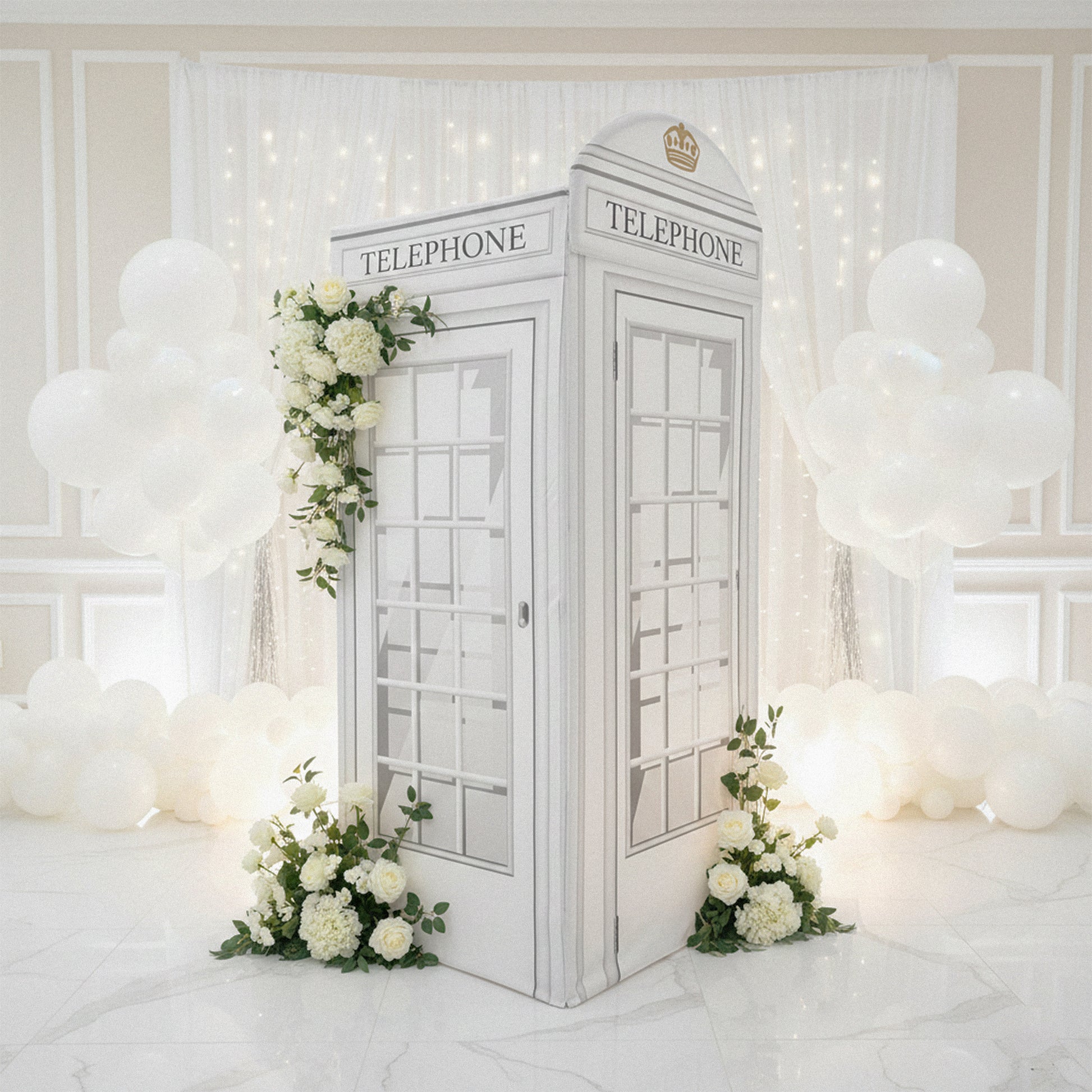 White Telephone Booth Printed Backdrop Spandex Cover paired with floral, balloons, and white backdrop with LED lights