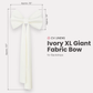 XL Giant Fabric Bow for Backdrop Ivory infographic showing product measurements of 107" in length and 50" wide