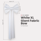 XL Giant Fabric Bow for Backdrop White infographic showing product measurements of 107" in length and 50" wide