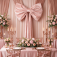 XL Velvet Giant Fabric Bow for Backdrop - Pastel Pink behind a bridal table