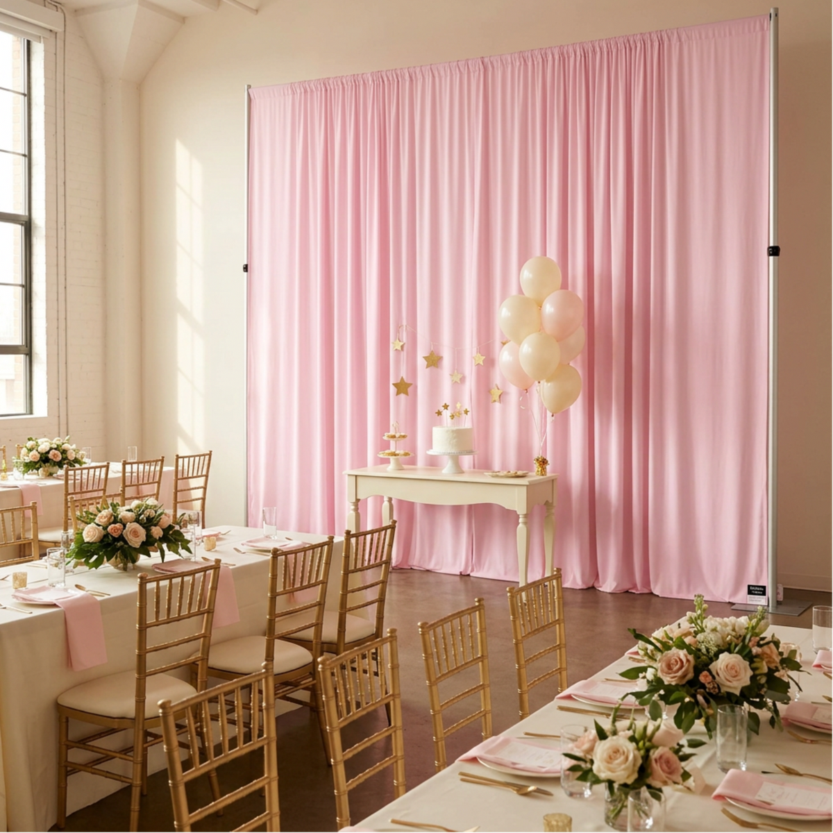 Moon-and-stars baby shower with pink drape