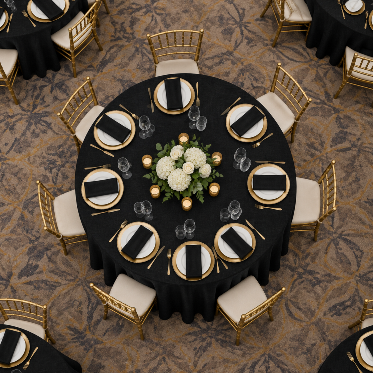 Overhead view of black panama tablecloth in a ballroom