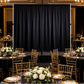 Black scuba backdrop at a black-and-gold evening gala