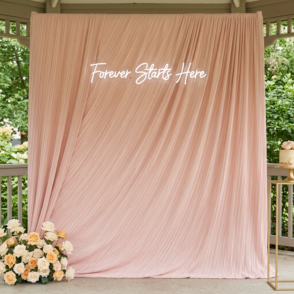 Blush pleated backdrop with Forever Starts Here neon